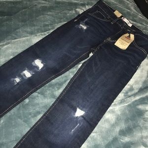 Mid Rise GIRLFRIEND ripped jeans